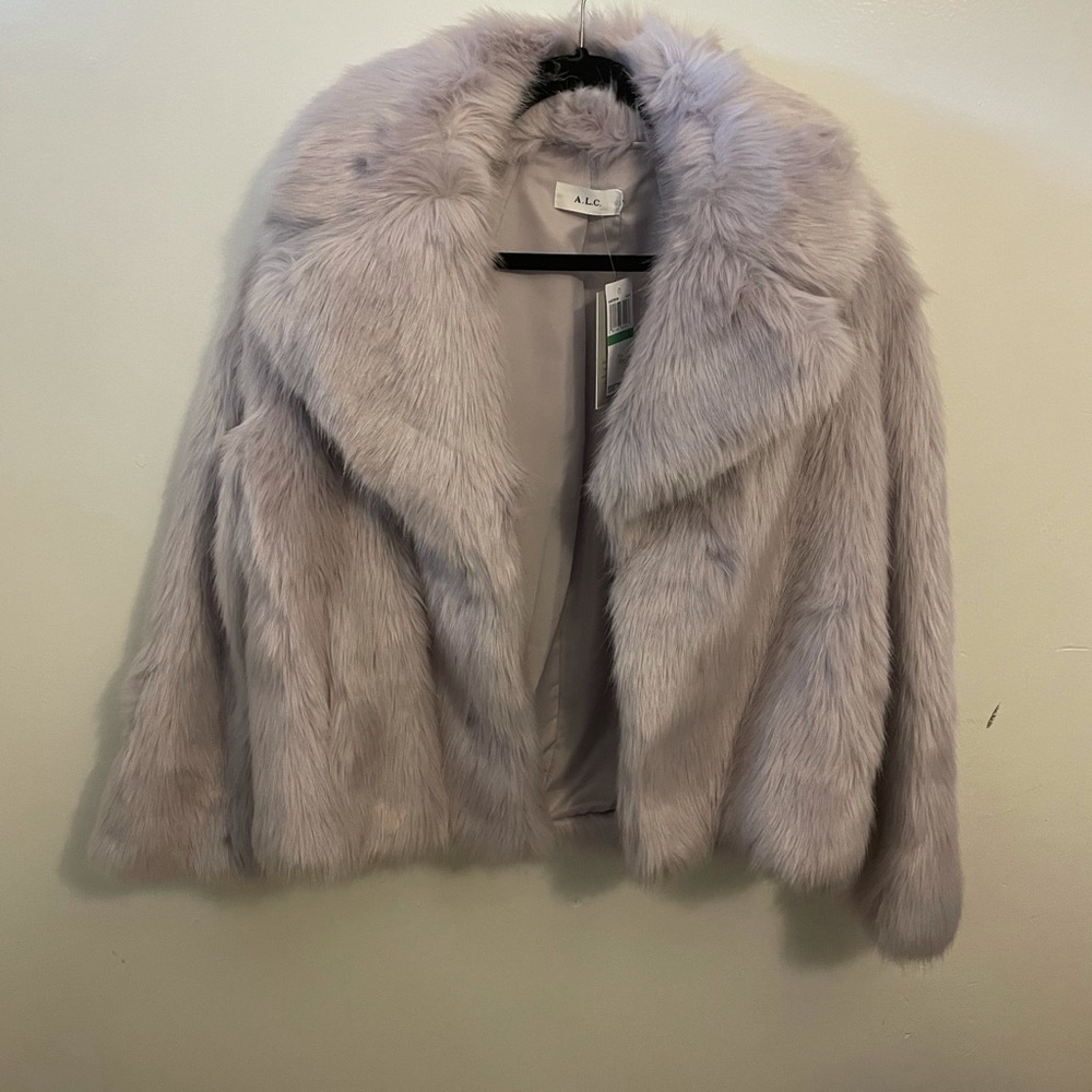 A. L. C Faux Fur Jacket size Large, 2 side pockets. Lavender color brand new